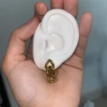 Pendientes en forma de cadena hechos de acero inoxidable y oro